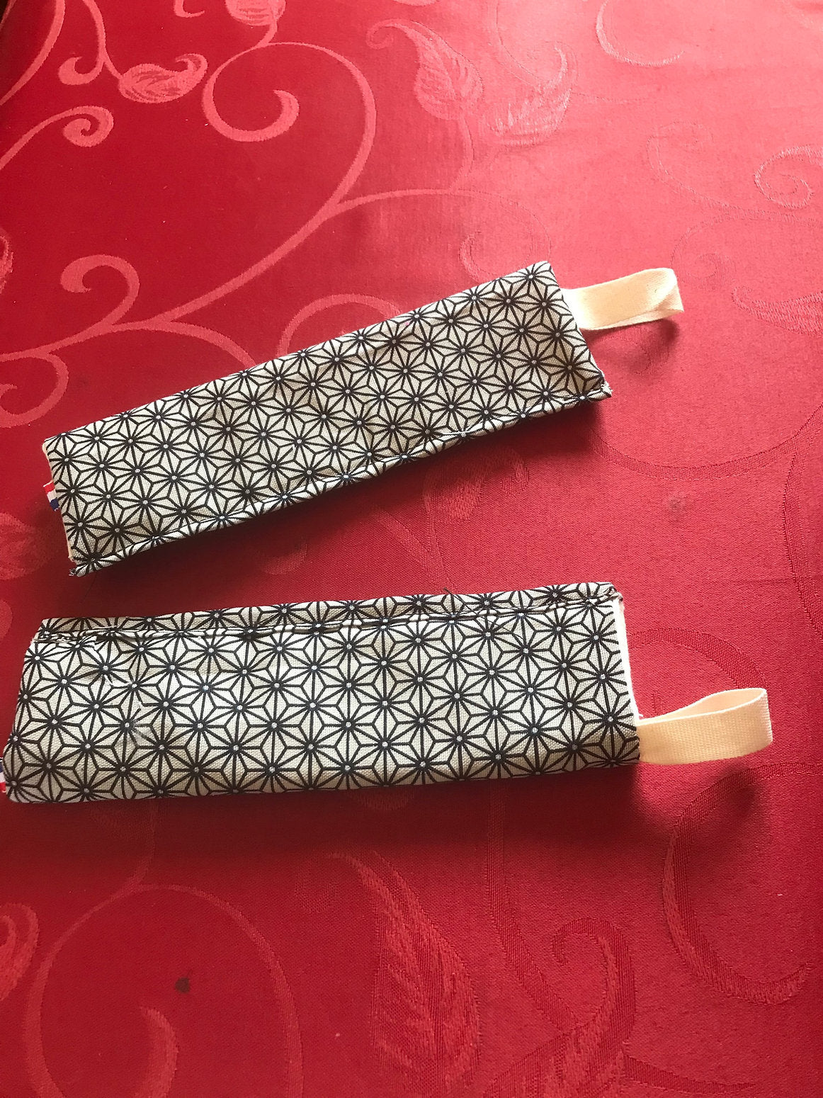 Manique pour queue de poêle