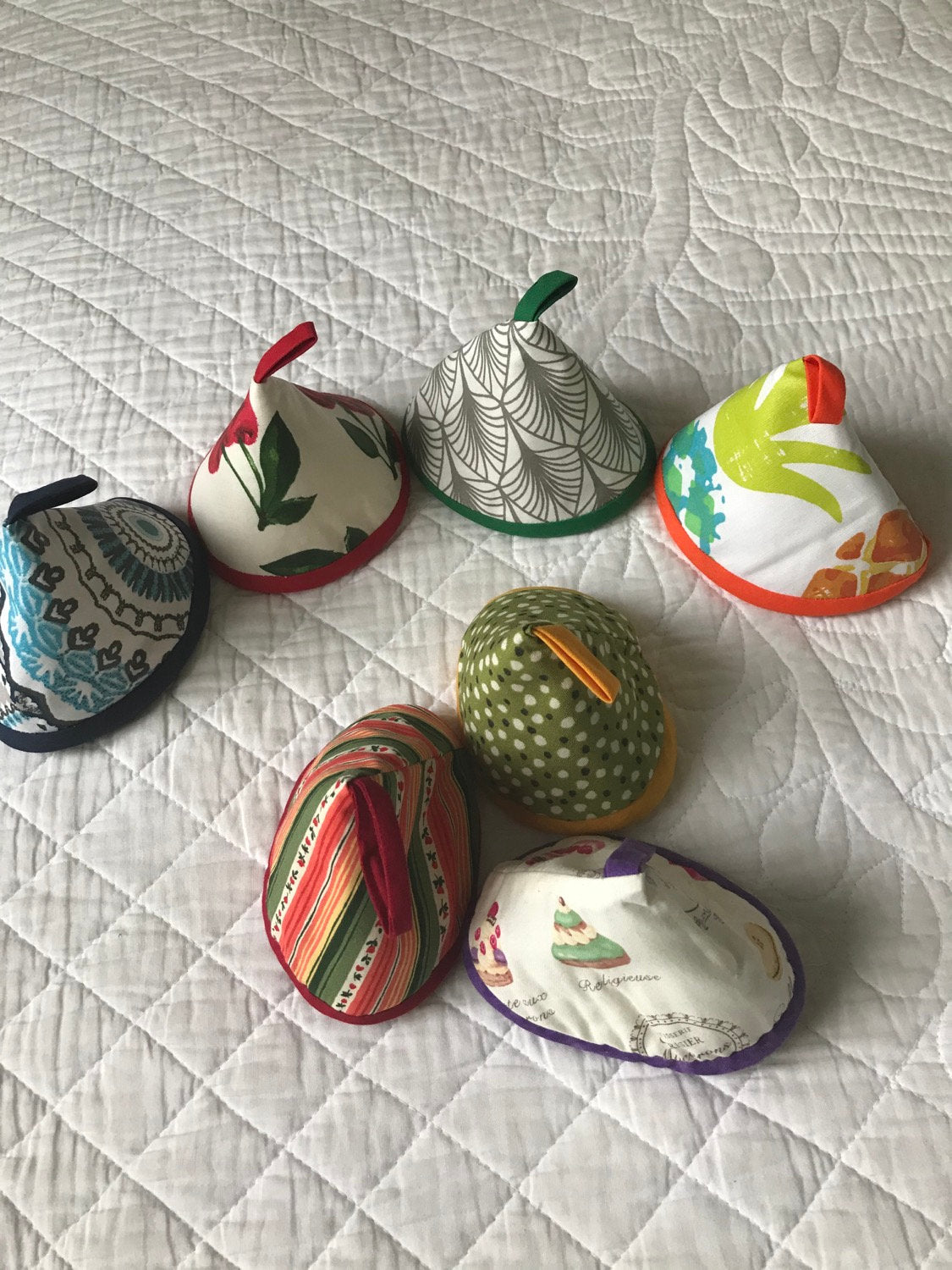 Maniques pour les couvercles de cocotte